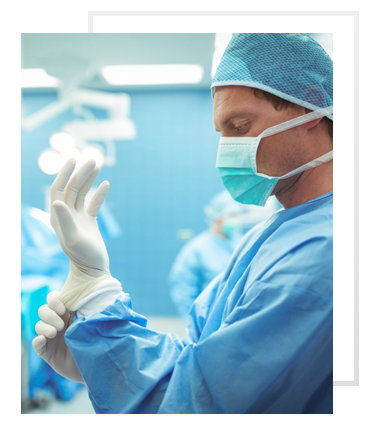 Plastic surgeon preparing for surgery.