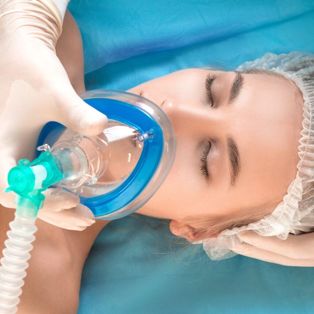 A woman receiving anesthesia