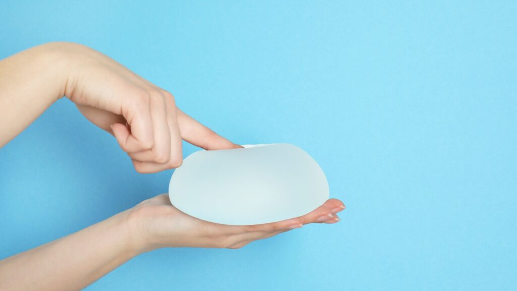 Finger poking breast implant