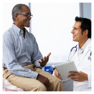 A man talking to his doctor happily