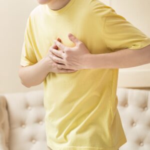 man grabbing chest
