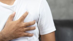 man grabbing chest